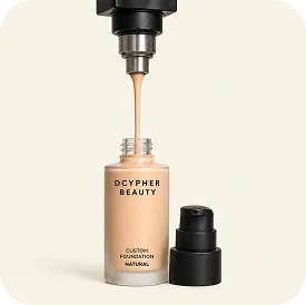 Custom foundation being dispensed into a DCYPHER bottle